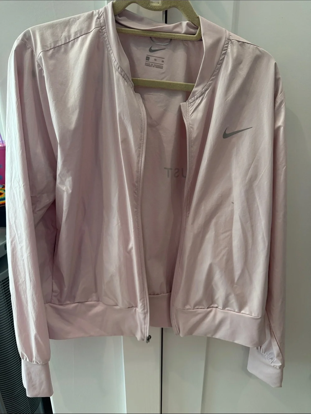 Nike Women's Light Pink windbreaker Jacket with Swoosh